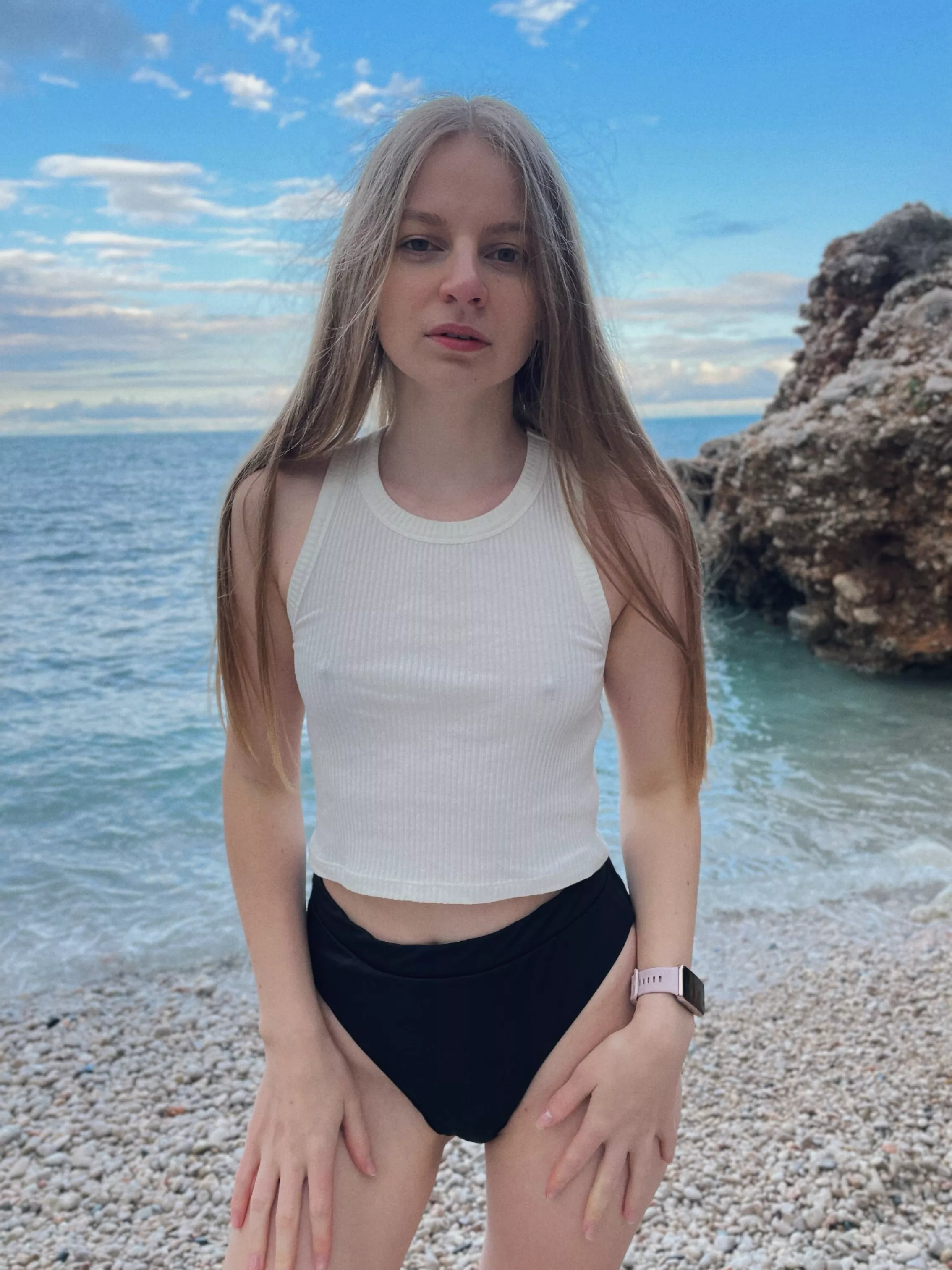 Little babe alone on the beach😈