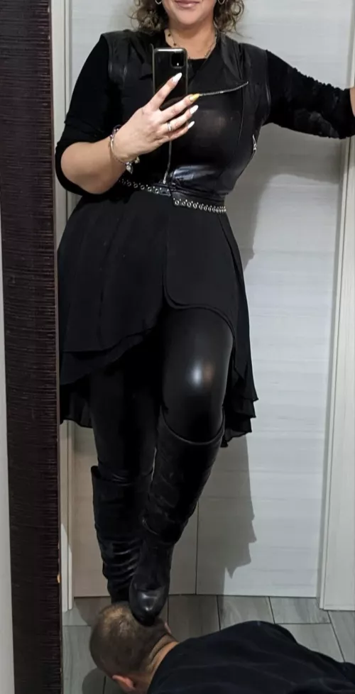 The mistress exits. the slave cleans