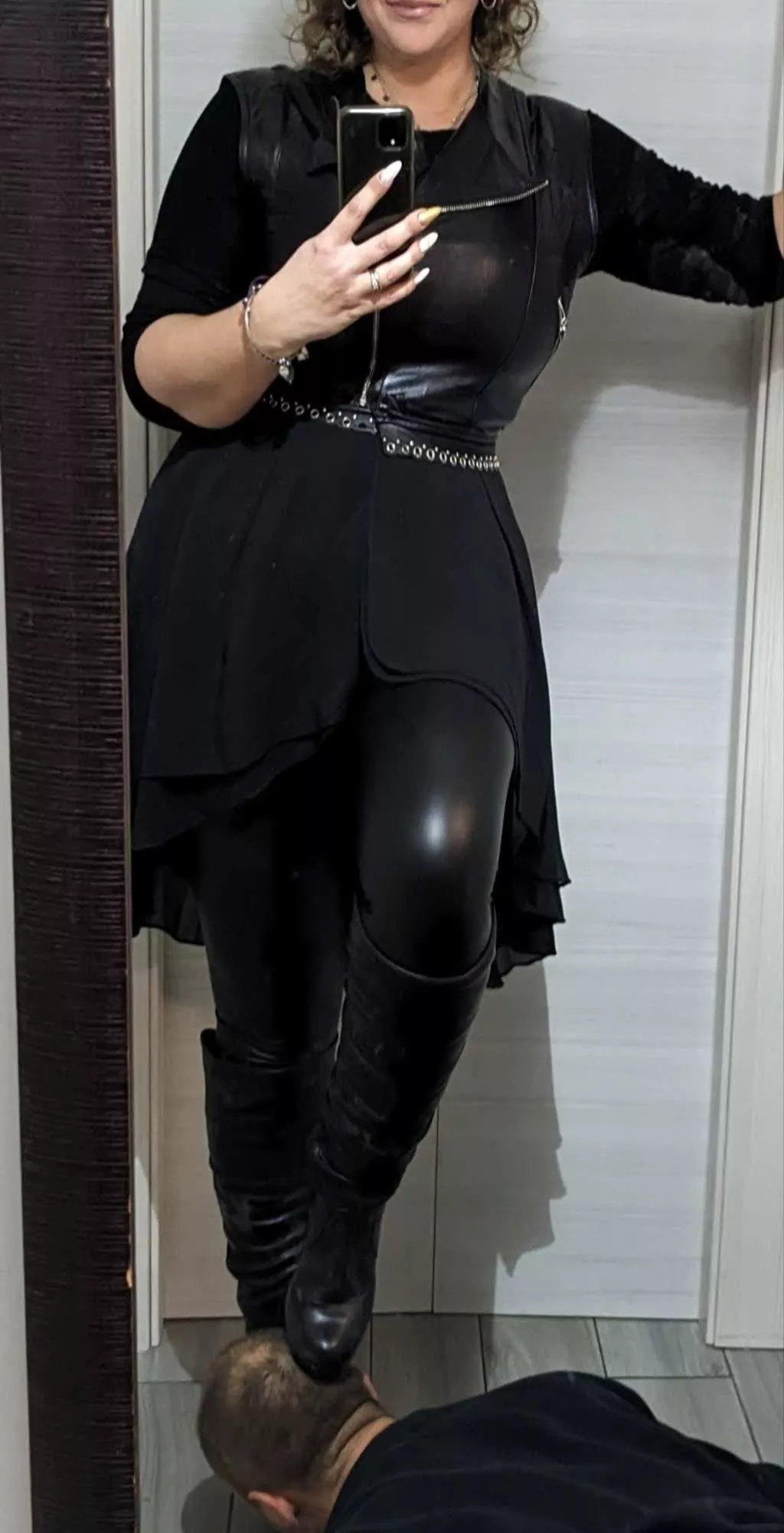 The mistress exits. the slave cleans