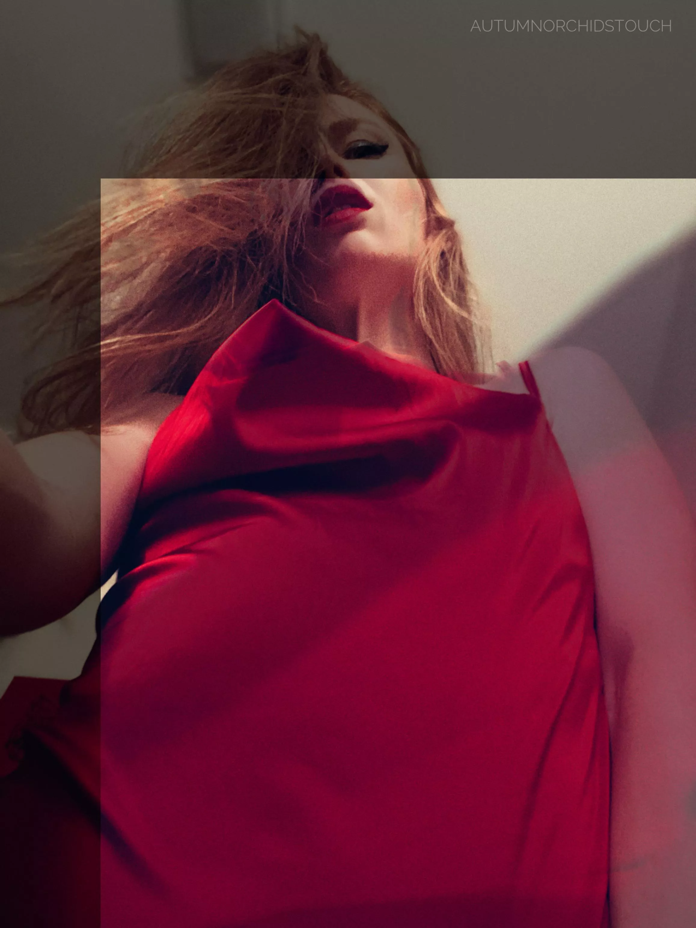 The up-angle view of my sensual body as I lean forward to subtly lift the hem of my holiday party gown…