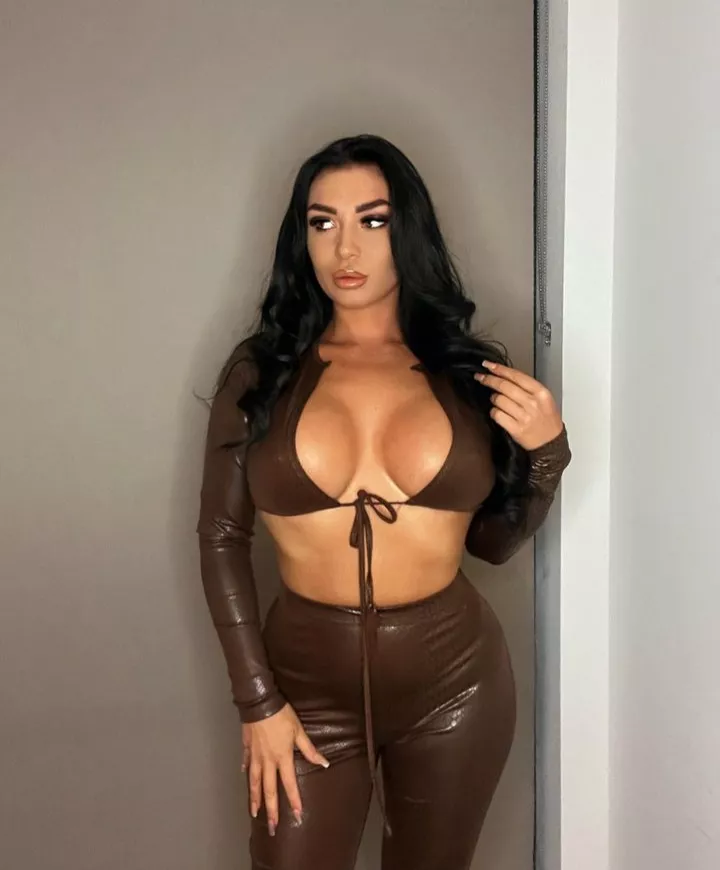 Dark-haired bimbo Callie in leather