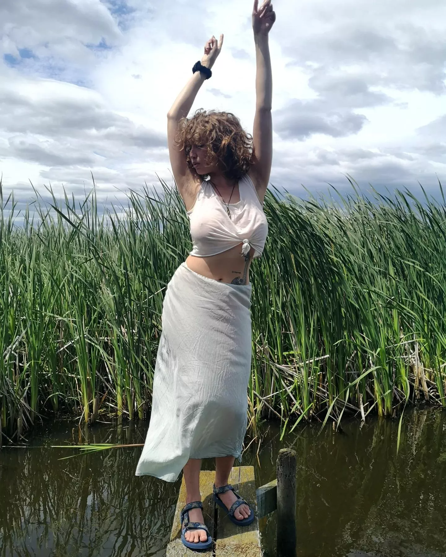 Doing the old braless boogie on the pier