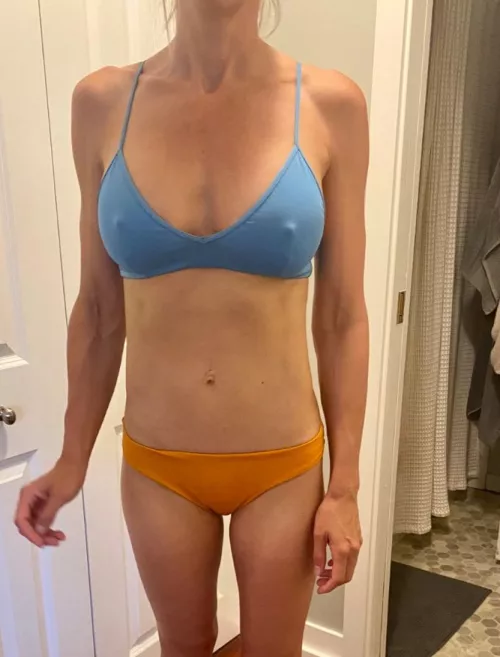 her sports bra never conceals her pokies. I often wonder how many looks she gets at the gym