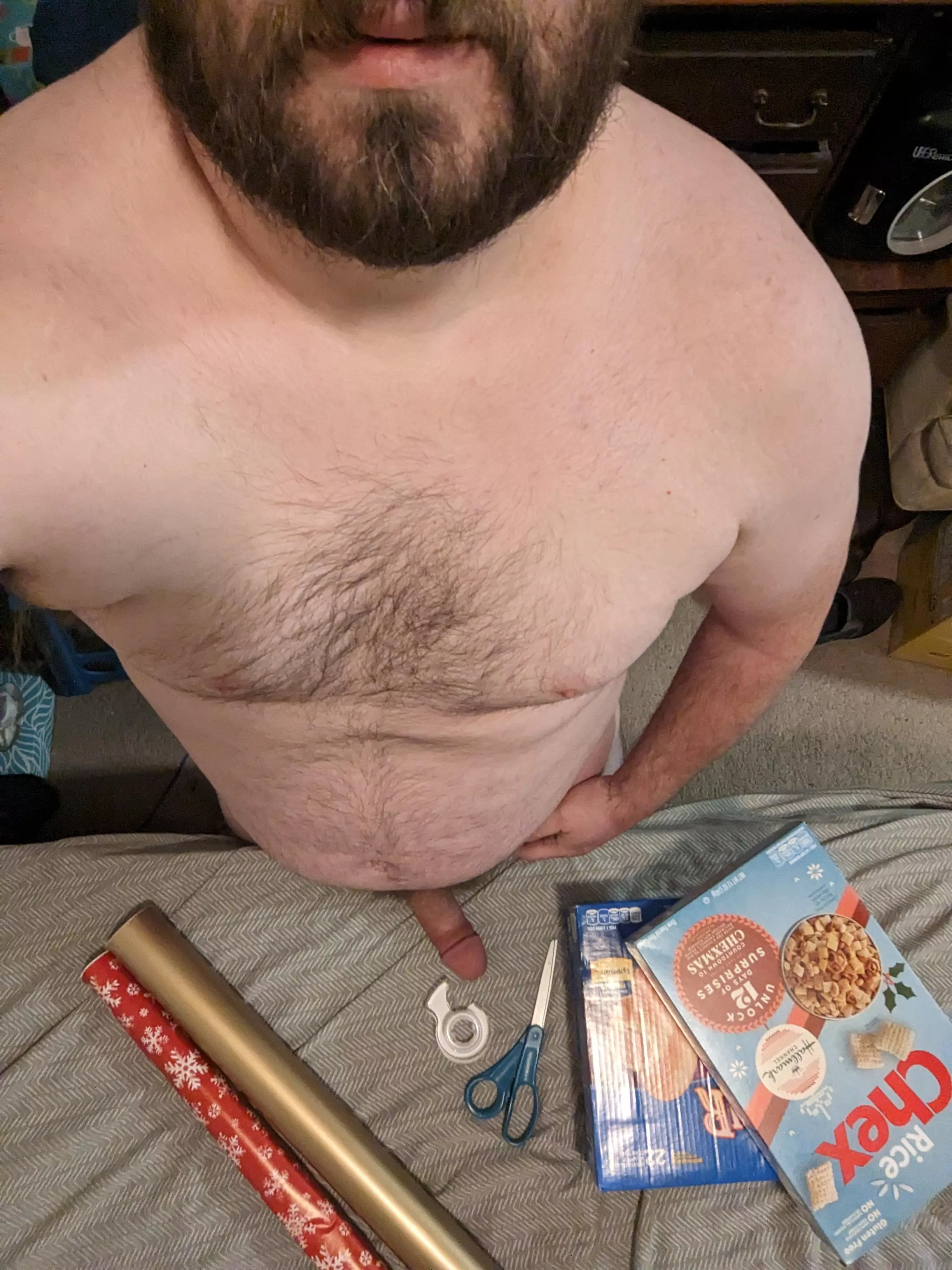 Just doing some naked present wrapping. Purposely reusing boxes for fun.