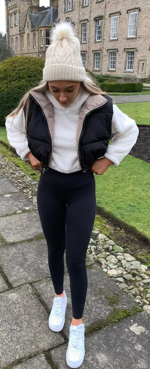 pulling her leggings up