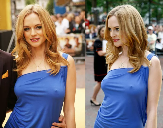 Heather Graham's nipples are so hard you can see the outline of her areola in this dress