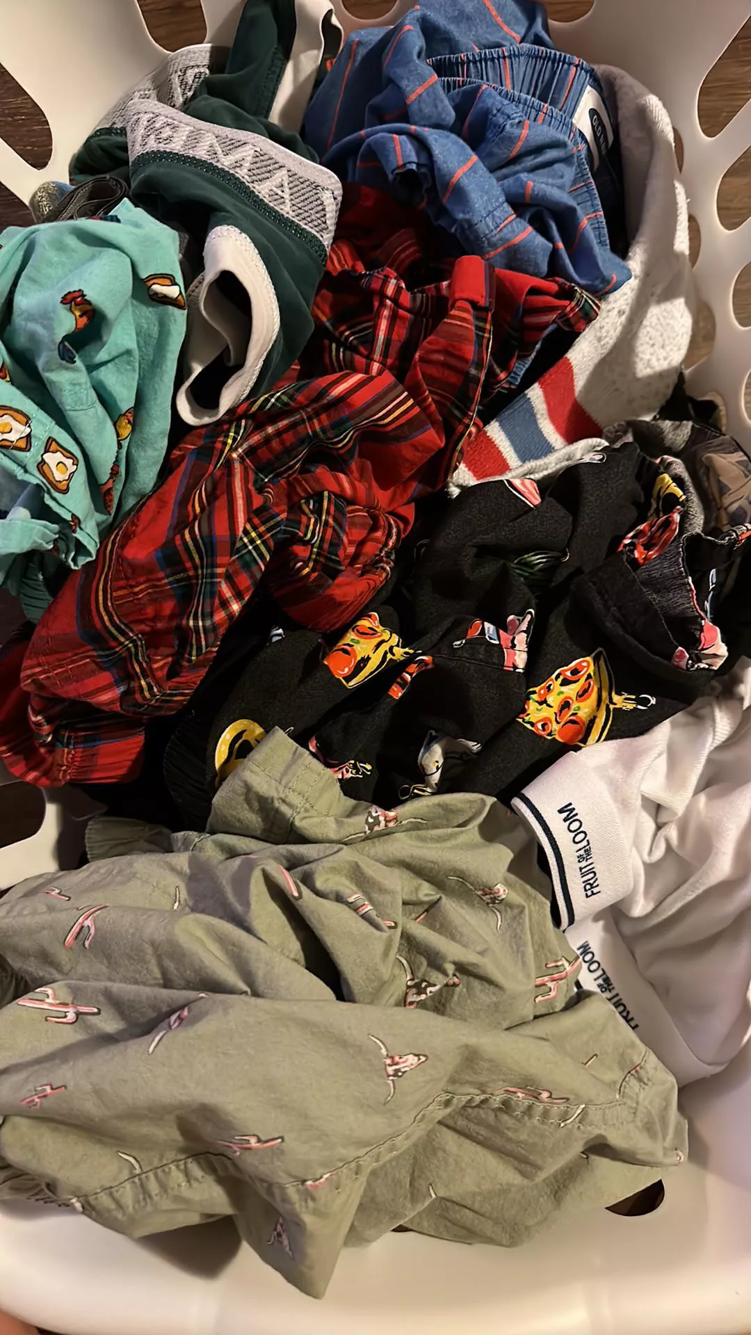 What do we think of this little snapshot of my current unfolded laundry basket of boxers??