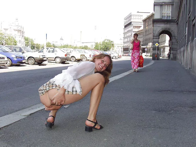 Flashing her asshole in front of random woman