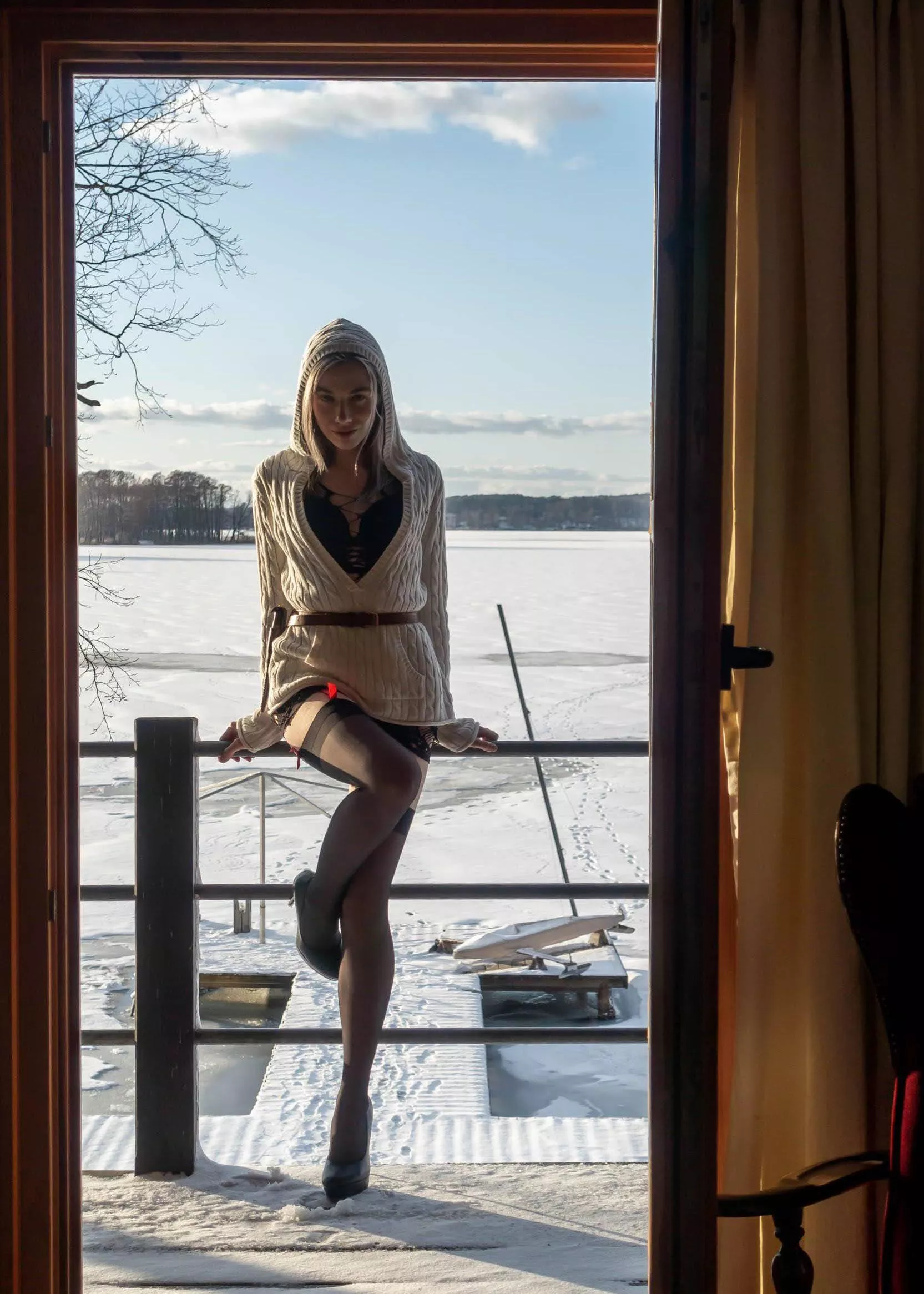 Heels and stockings and snow and me in teasing pose. 🌶️