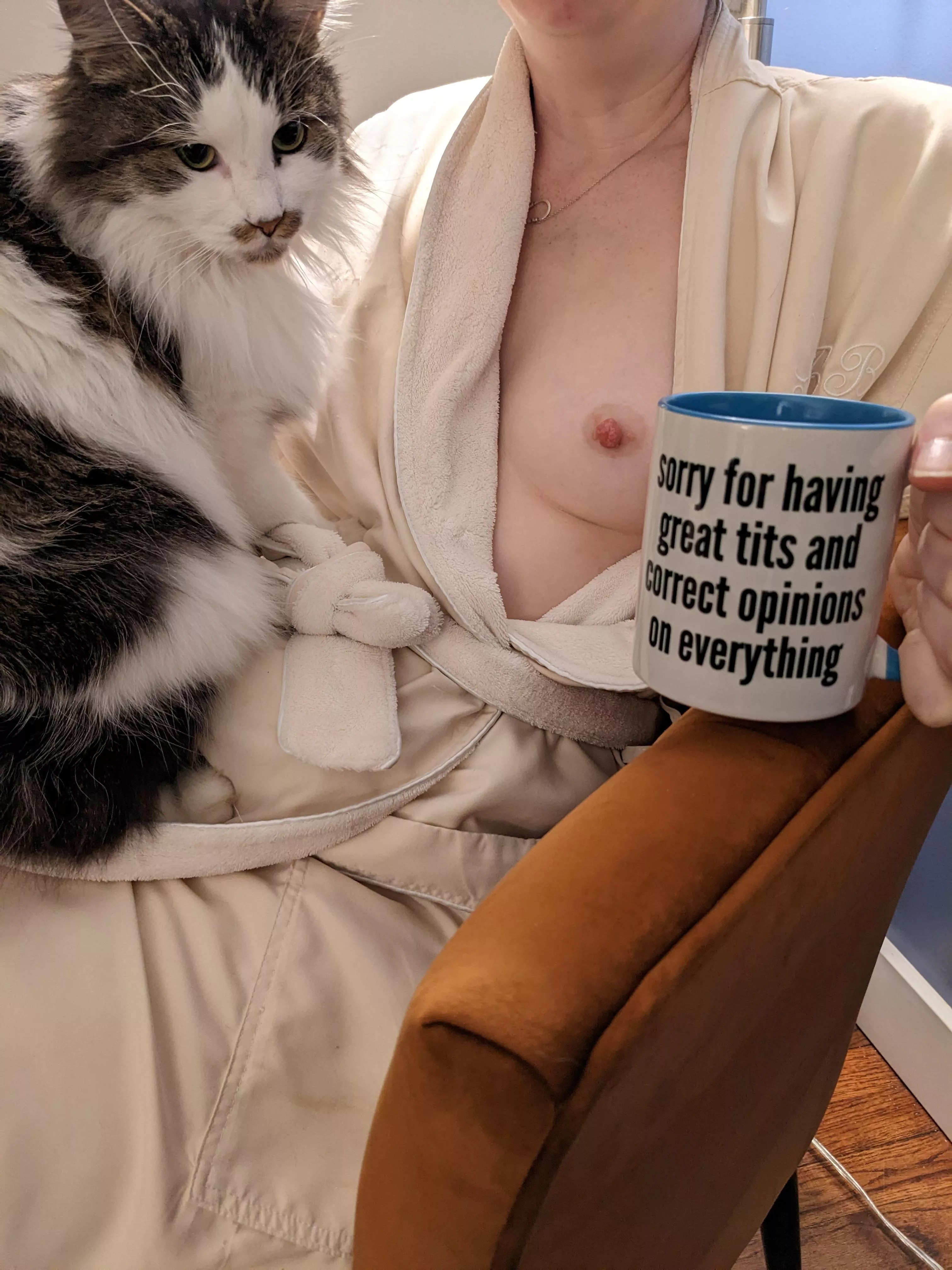 Is it me, or does she seem skeptical of the mug?