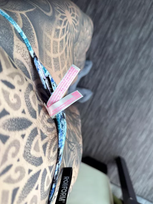 Tuck the tags in or cut them off?