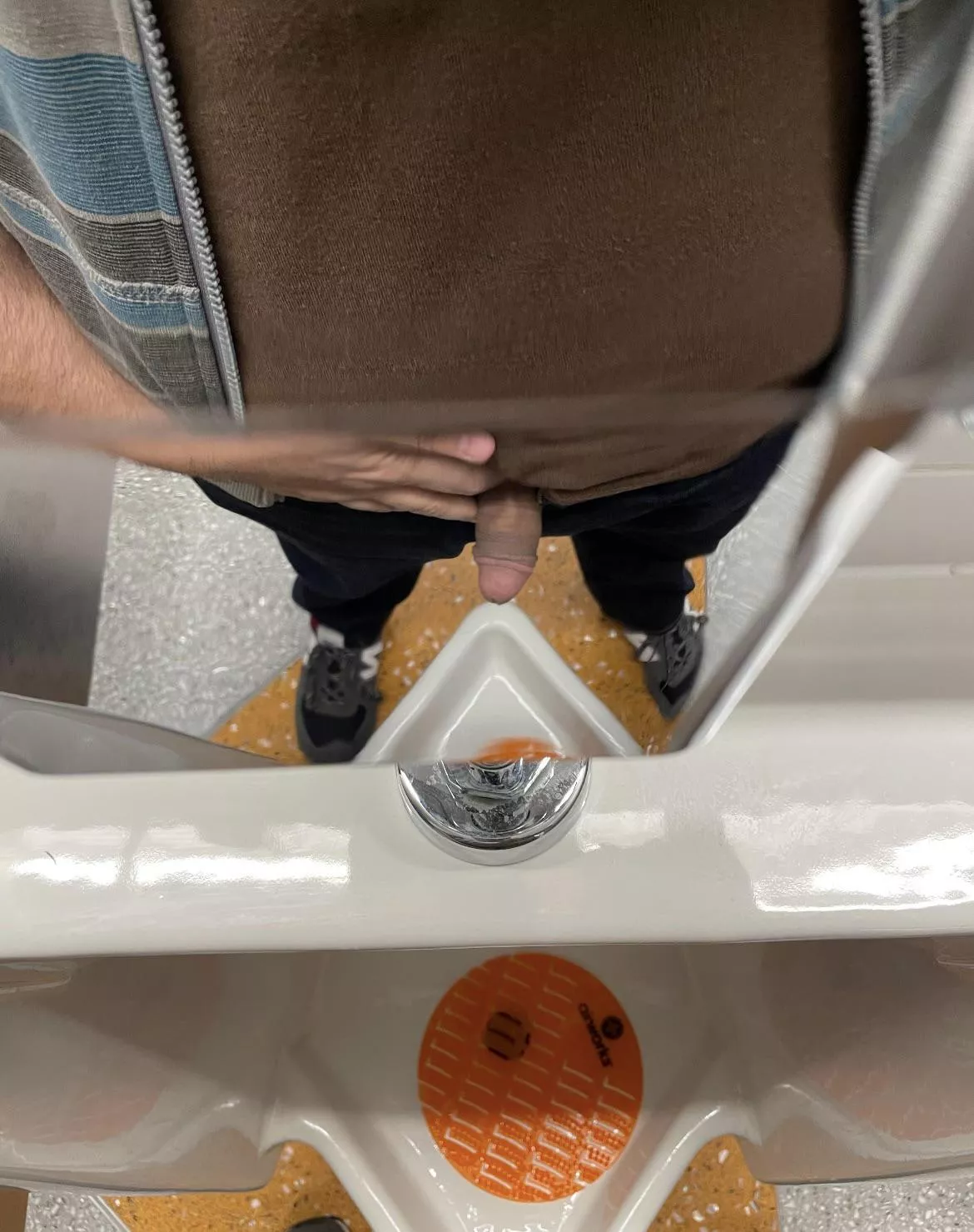 Airport urinal reflection