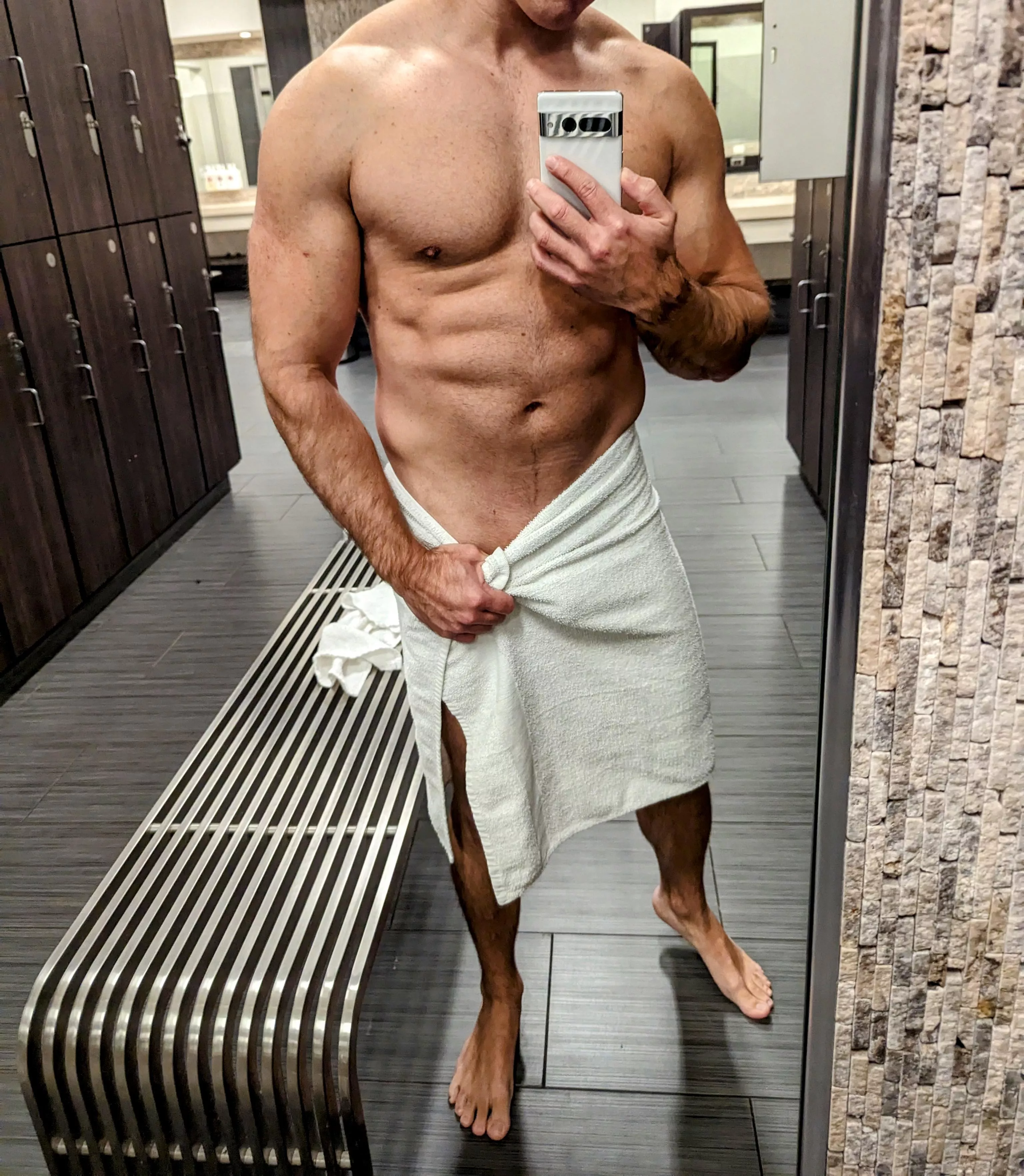 Barely keeping this towel on after my workout