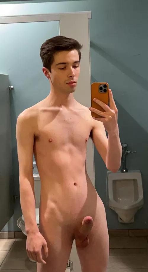 totally nude in a public restroom ;)
