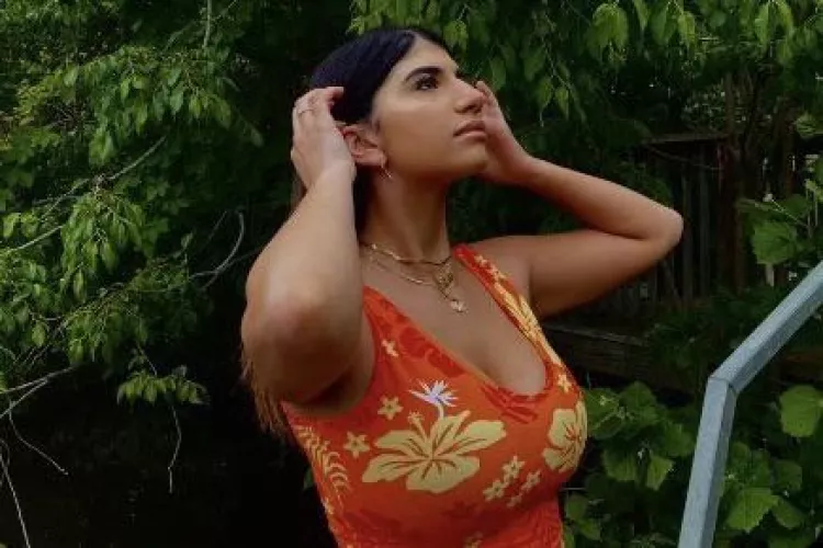 Busty in orange