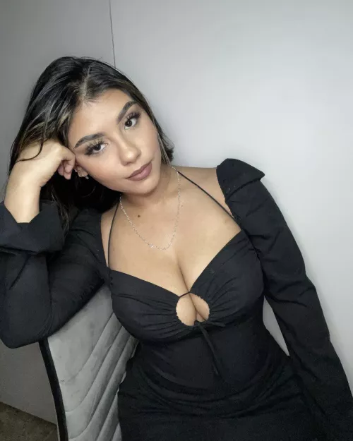 Cute Latina in black dress