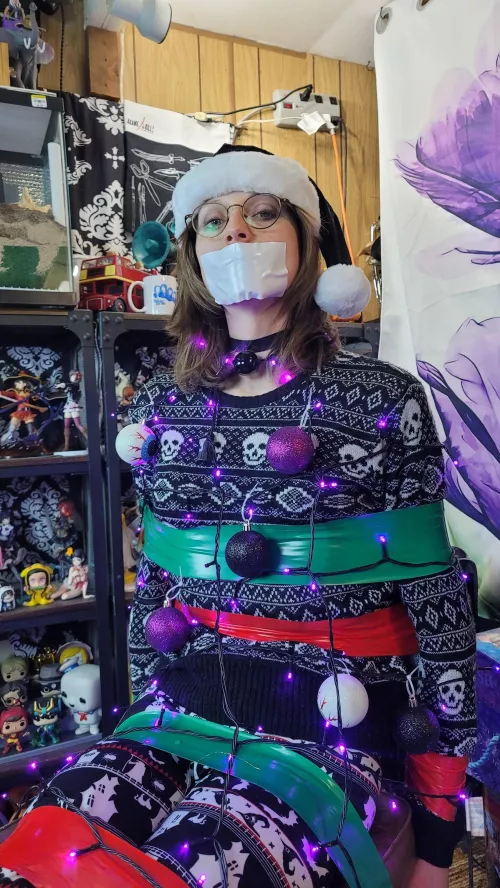 I love being tied with tape. Here's hoping everyone has a happy (and kinky) holiday!