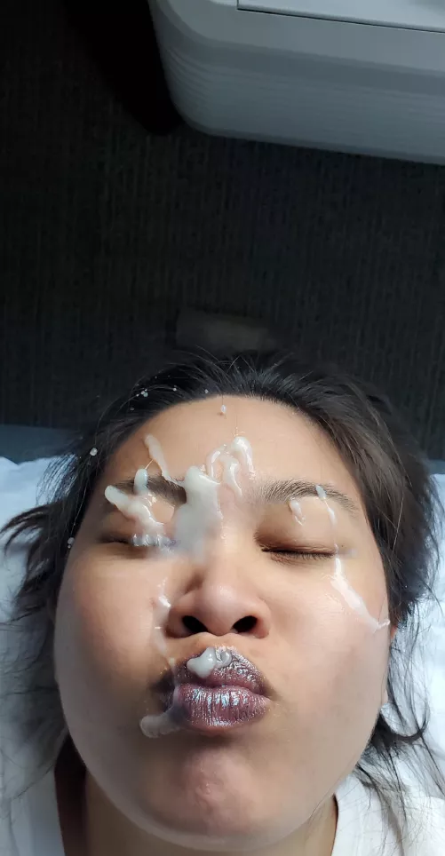 nice thick paste of cum over her eye