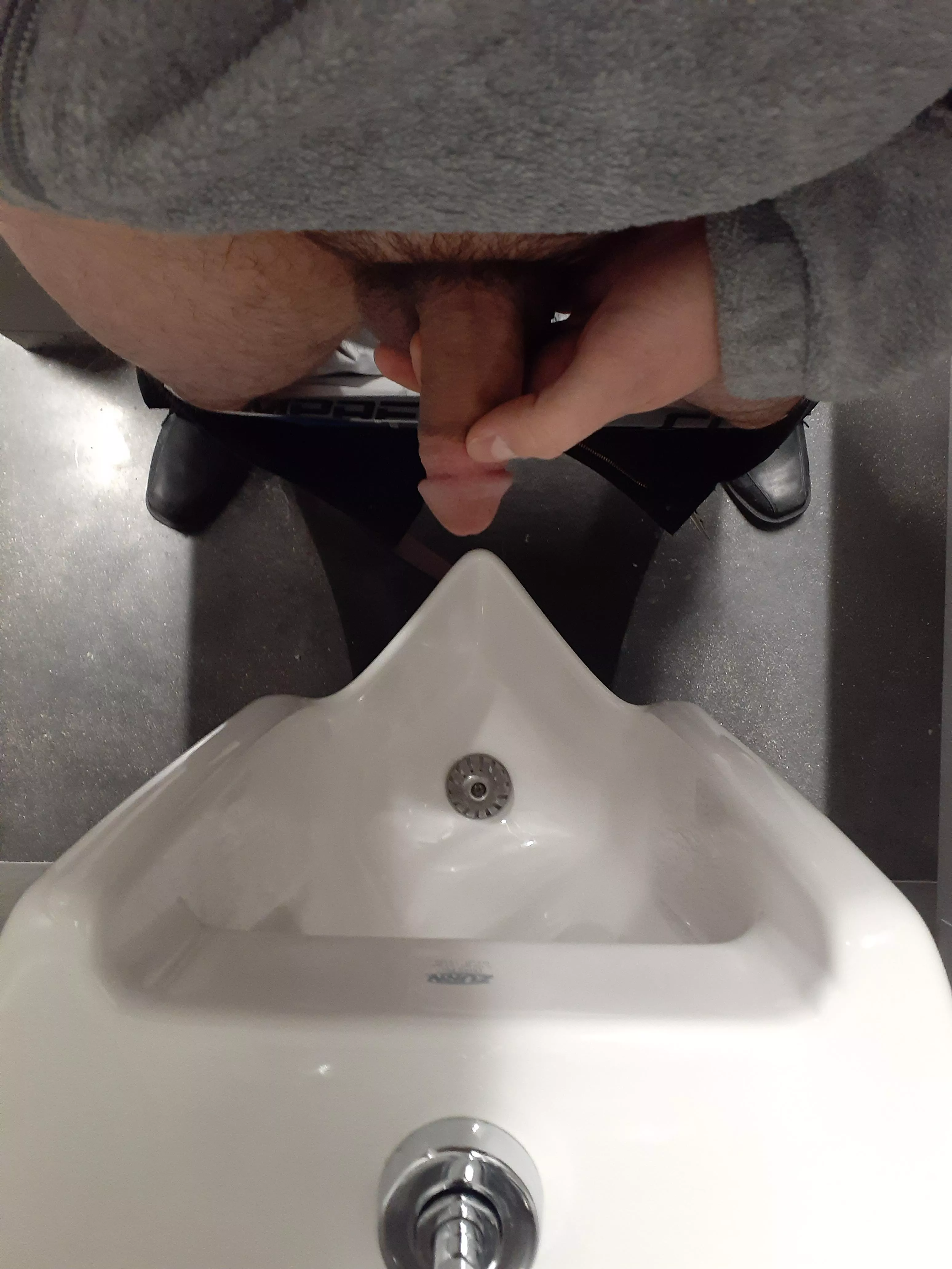 Pants around your ankles at the urinal...power move!