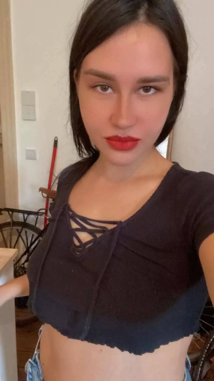 Red lips and no bra means a perfect day for me