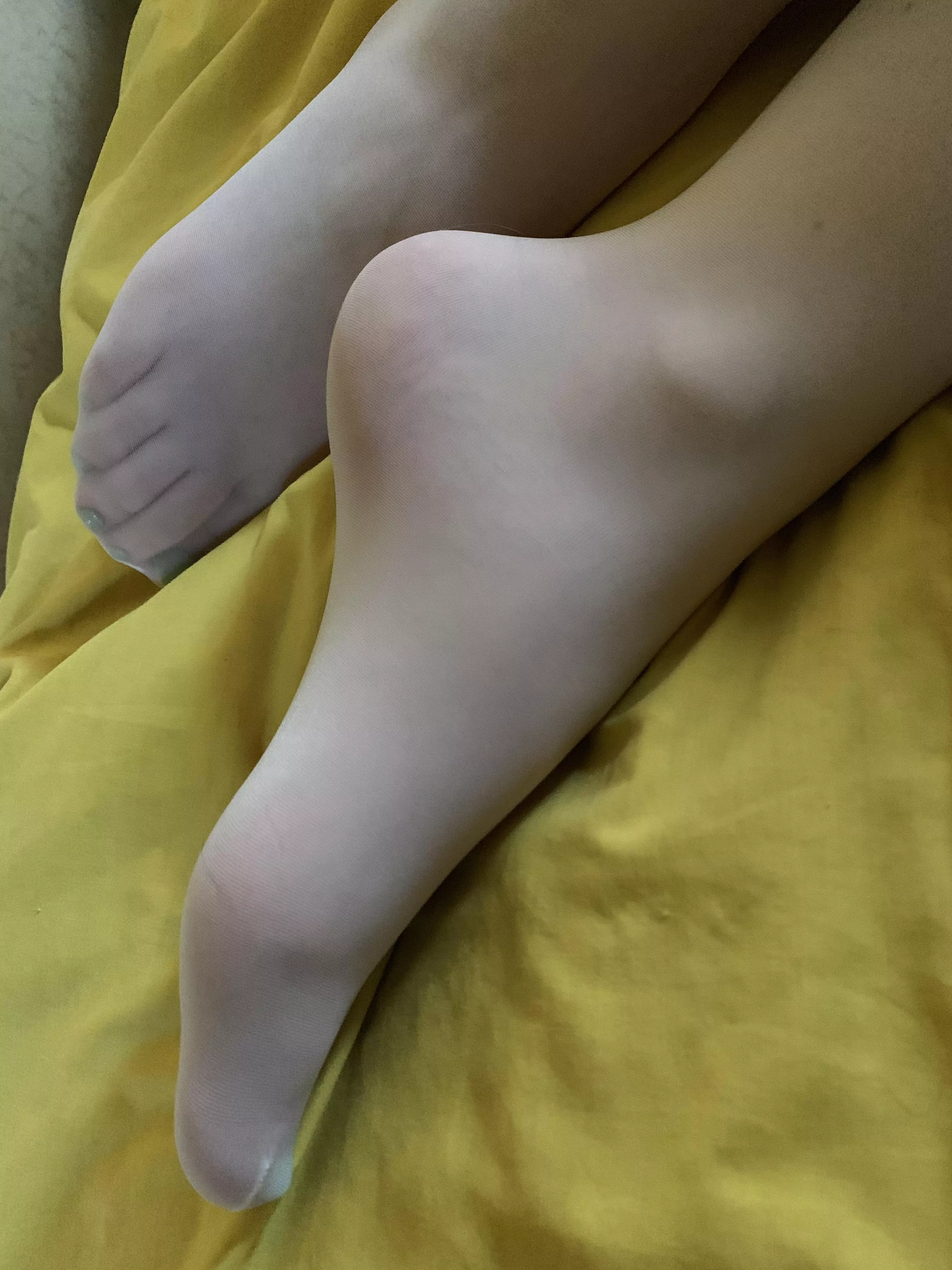 White pantyhose feet.