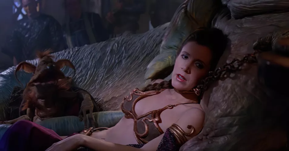 I'll get tired of seeing Slave Leia's revealing metal bikini. (1983)