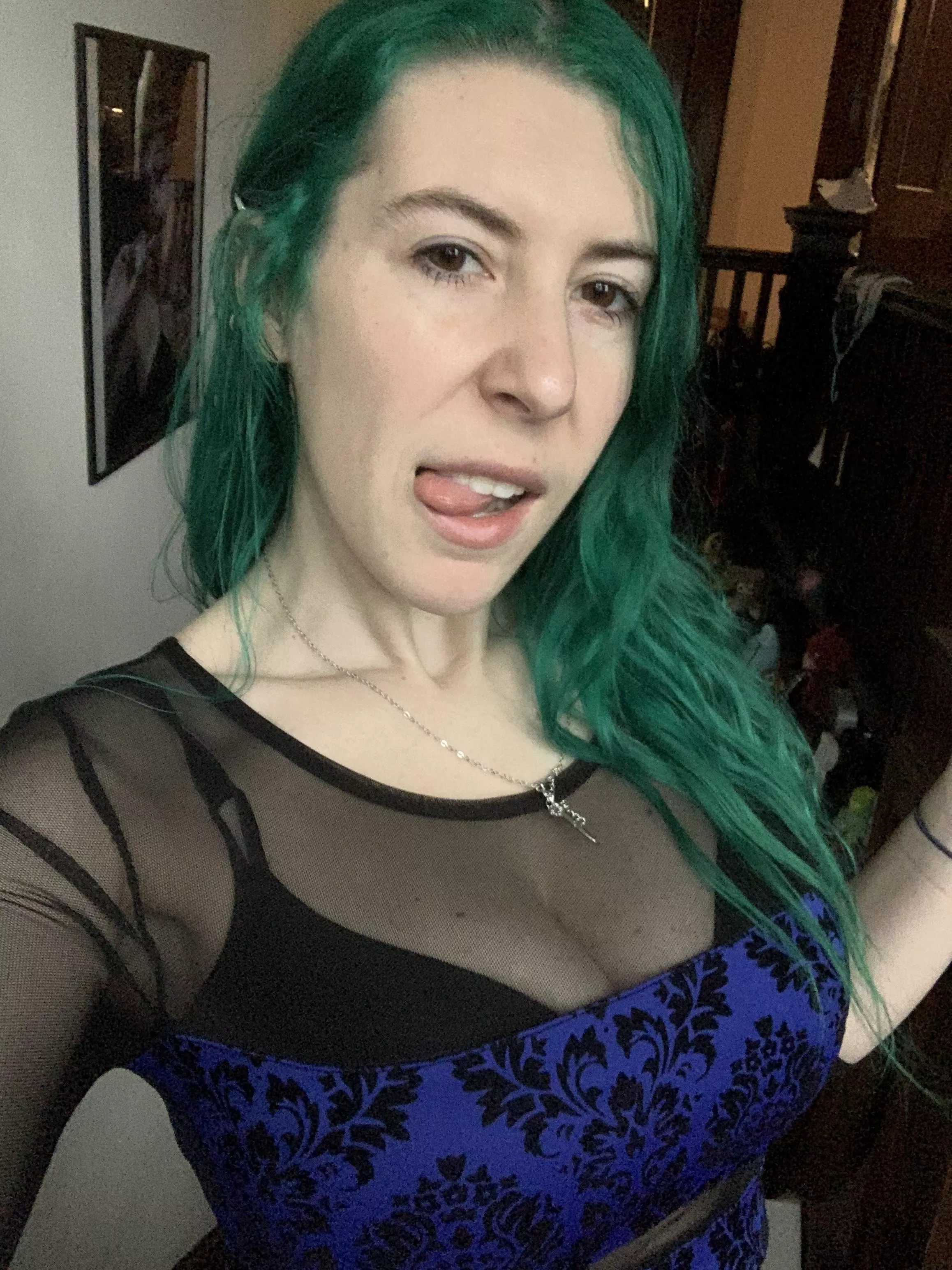 In a sheer crop top [image]