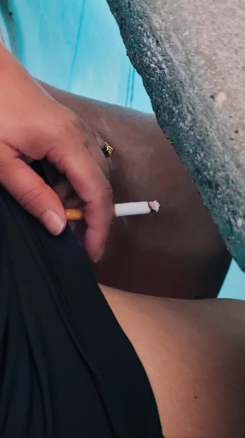 Pulling up my skirt a little while smoking