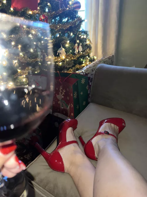 Red wine, red heels, red nail polish and lipstick