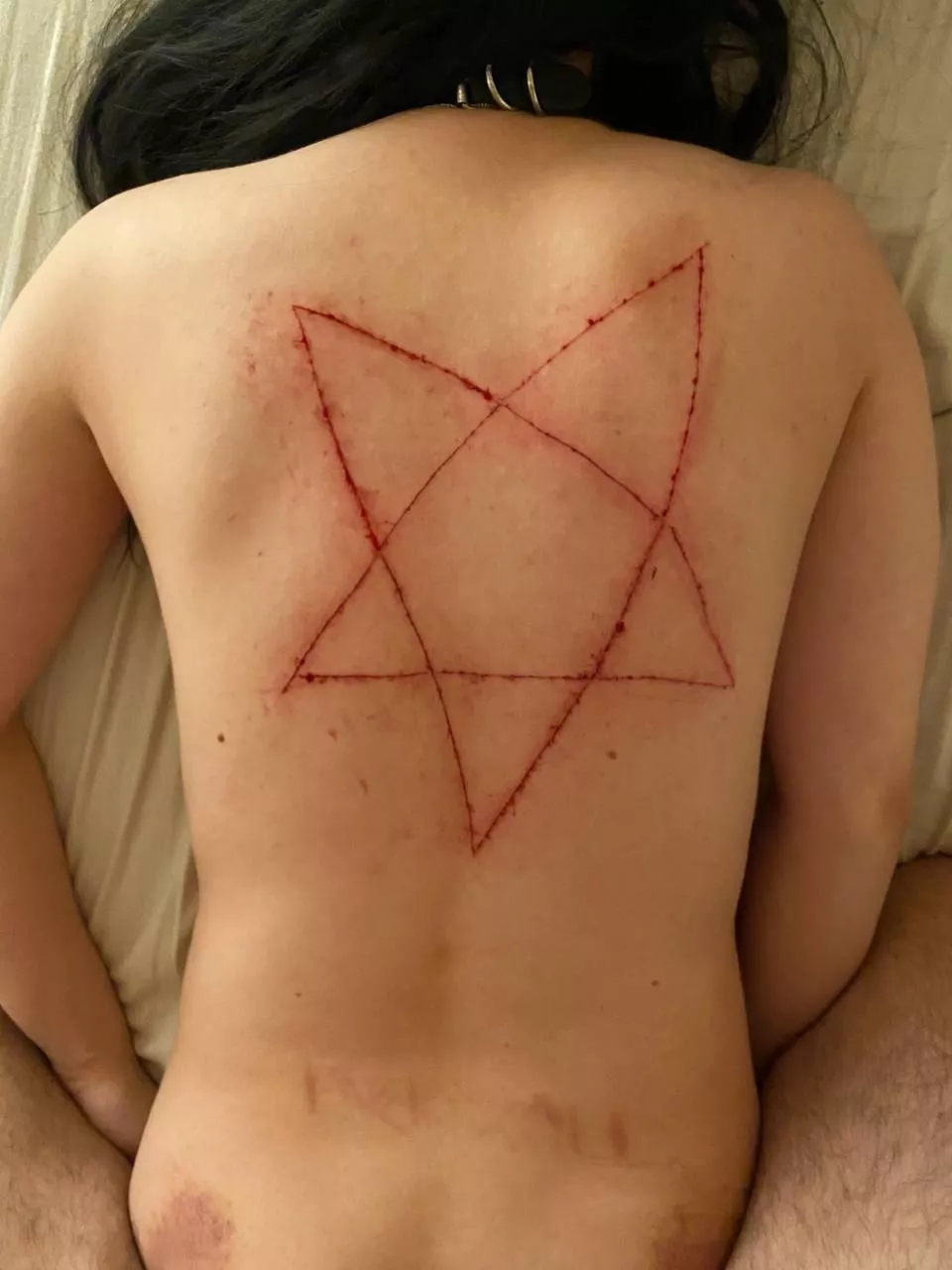 satanic slut.
