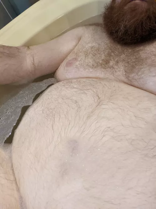 Rub a dub dub, fat man in a tub