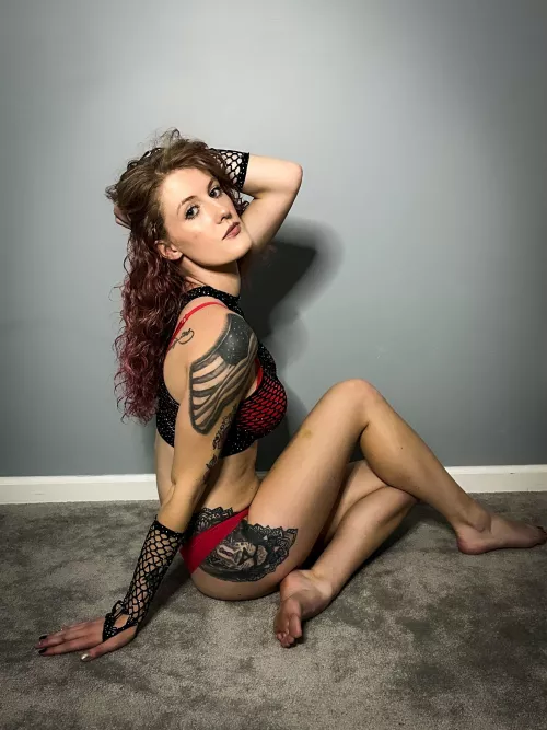 The best angle is the one with the most tattoos visible