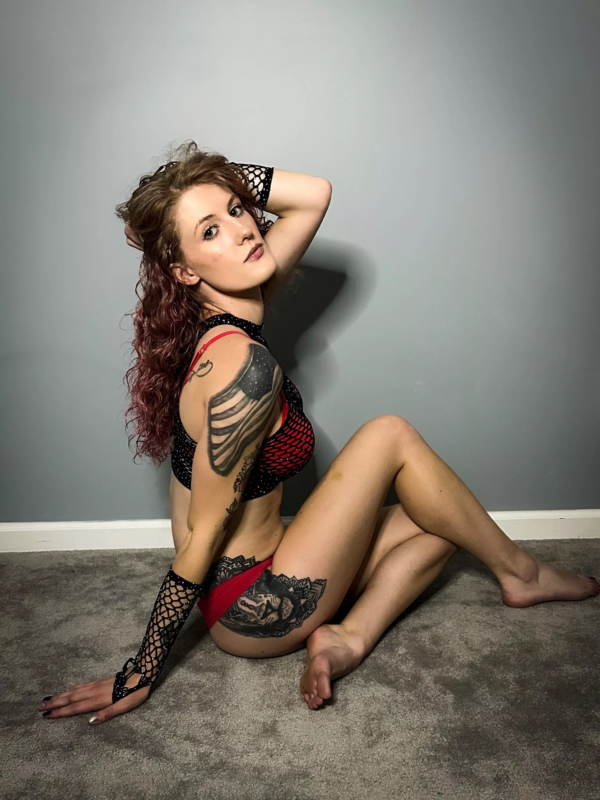 The best angle is the one with the most tattoos visible