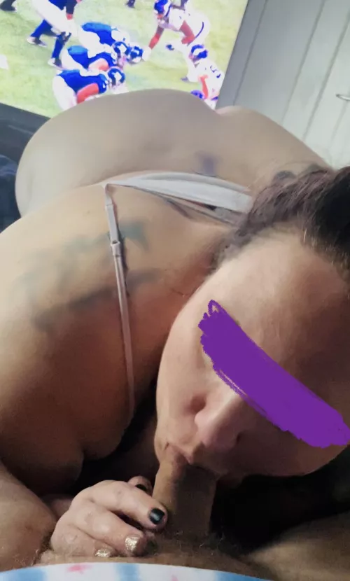 Trying to distract him from watching the game 😉