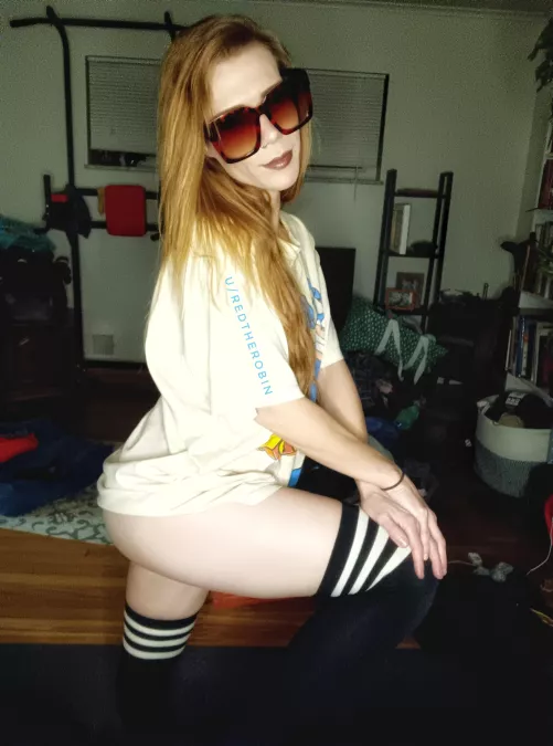 Black thigh-high gym socks on a ginger with thick thighs
