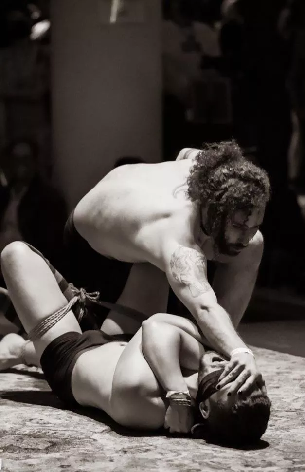 Blindfolded and tied for an audience