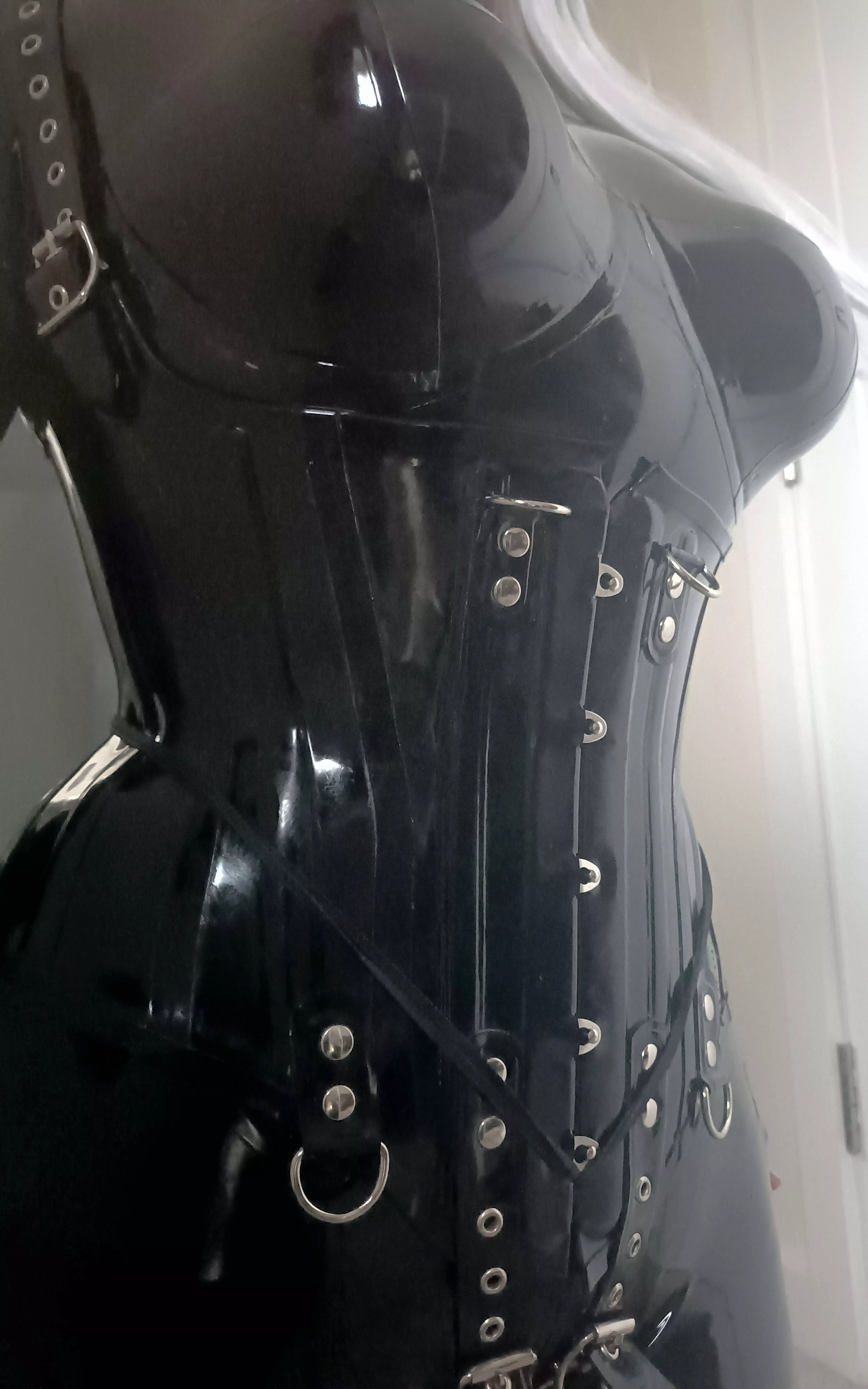 I love my heavy rubber corset!