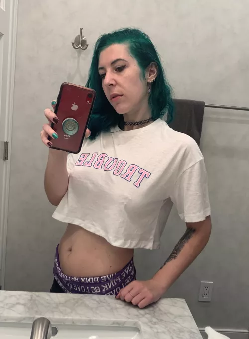 I'm Trouble, just as the shirt says