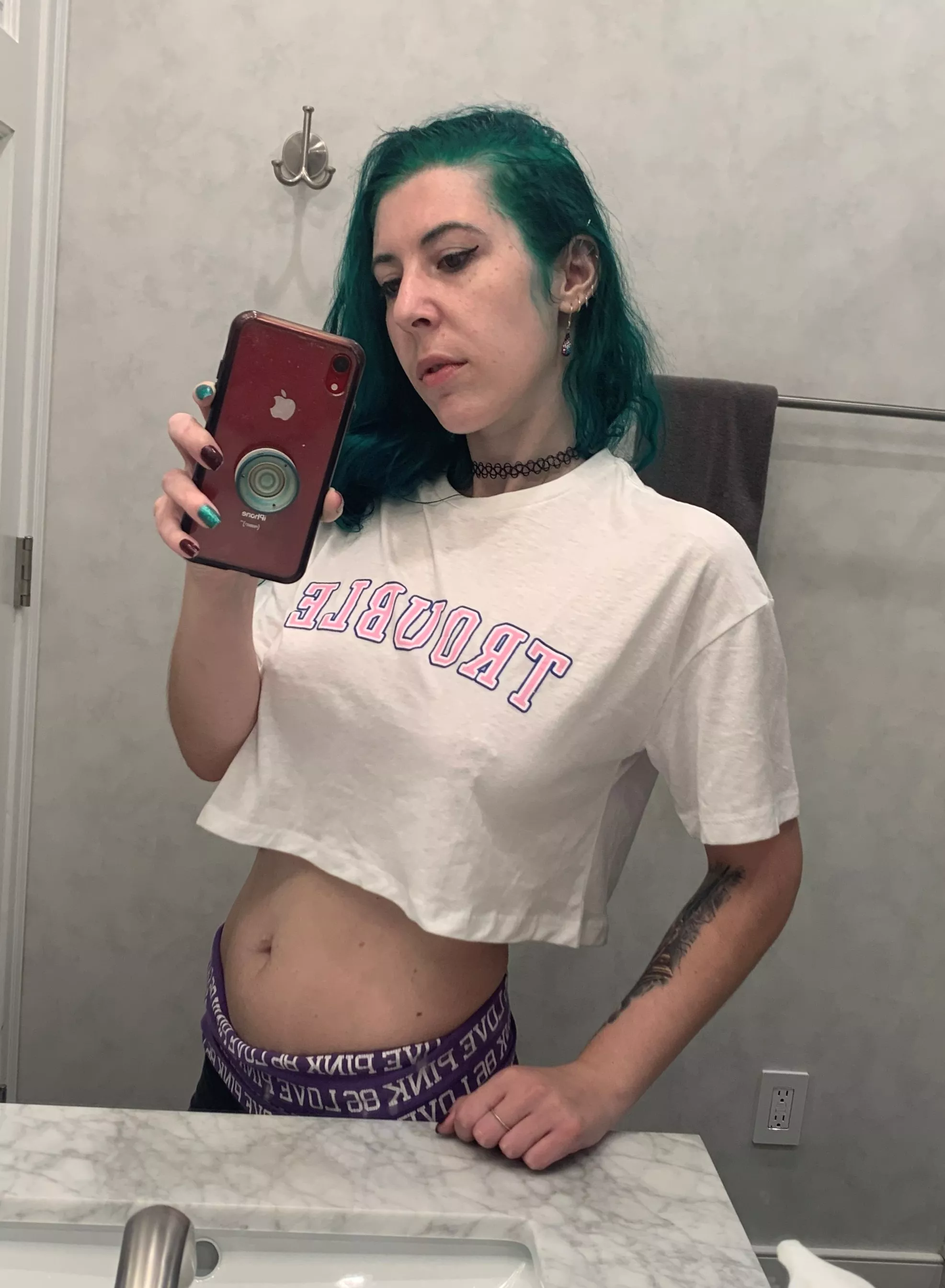 I'm Trouble, just as the shirt says