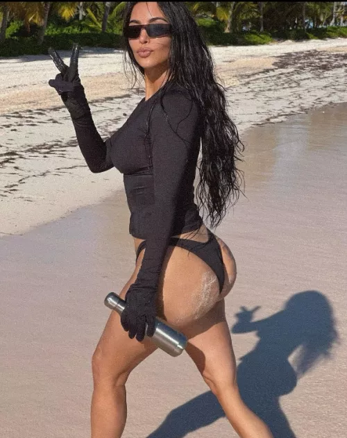 She looks so perfect her fat ass in that little thong with a bit of sand on one cheek looks so seductive for some reason