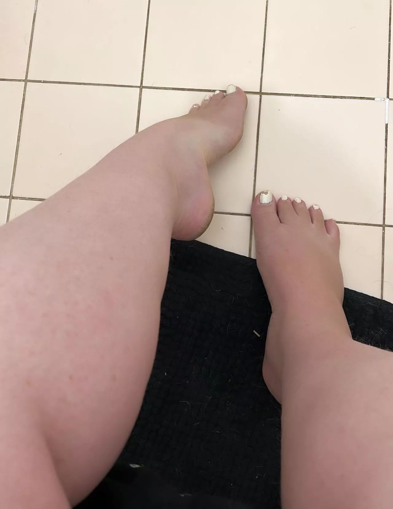 Chipped white toes, dirty heels + a high arch…