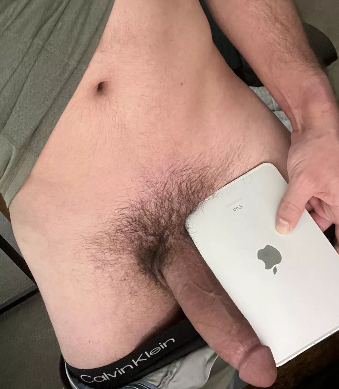 Hanging semi next to 8” iPad mini