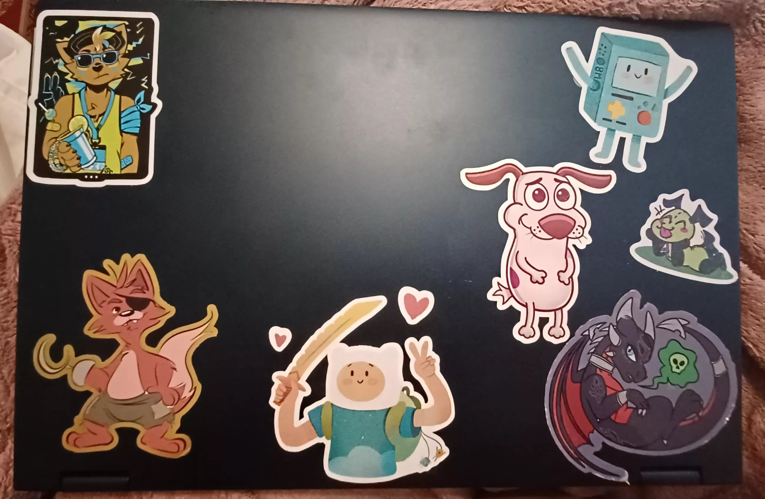 So I slapped a bunch of stickers on my school laptop and I wonder how long it'll take for ppl to find out I enjoy fur creatures