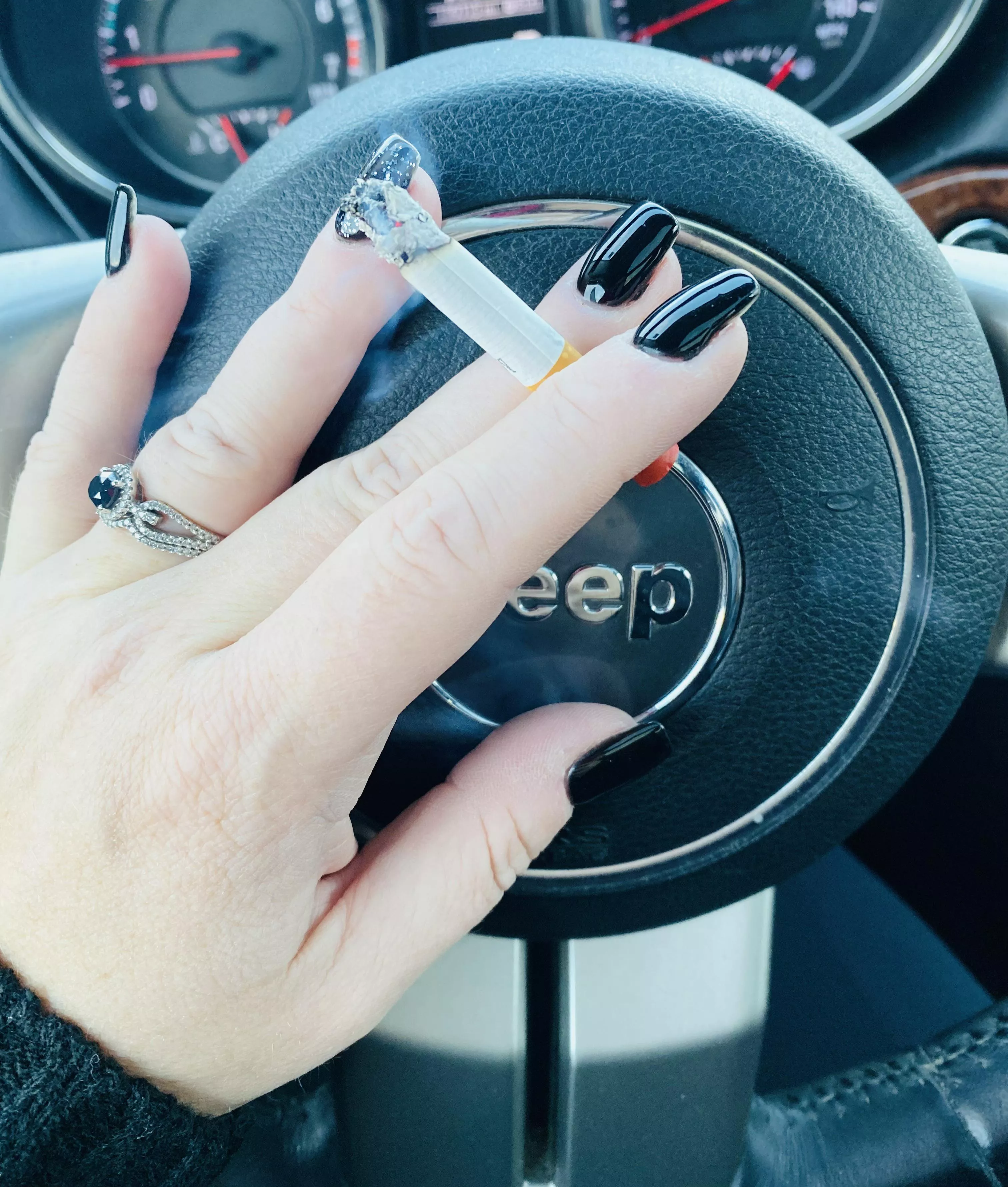 Just got my nails done, how do they look holding a cigarette?