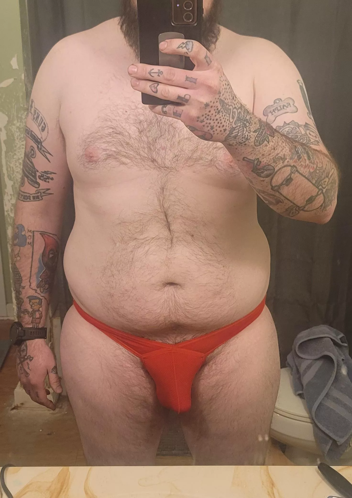 Mechanic underneath their uniform, you need any repairs?