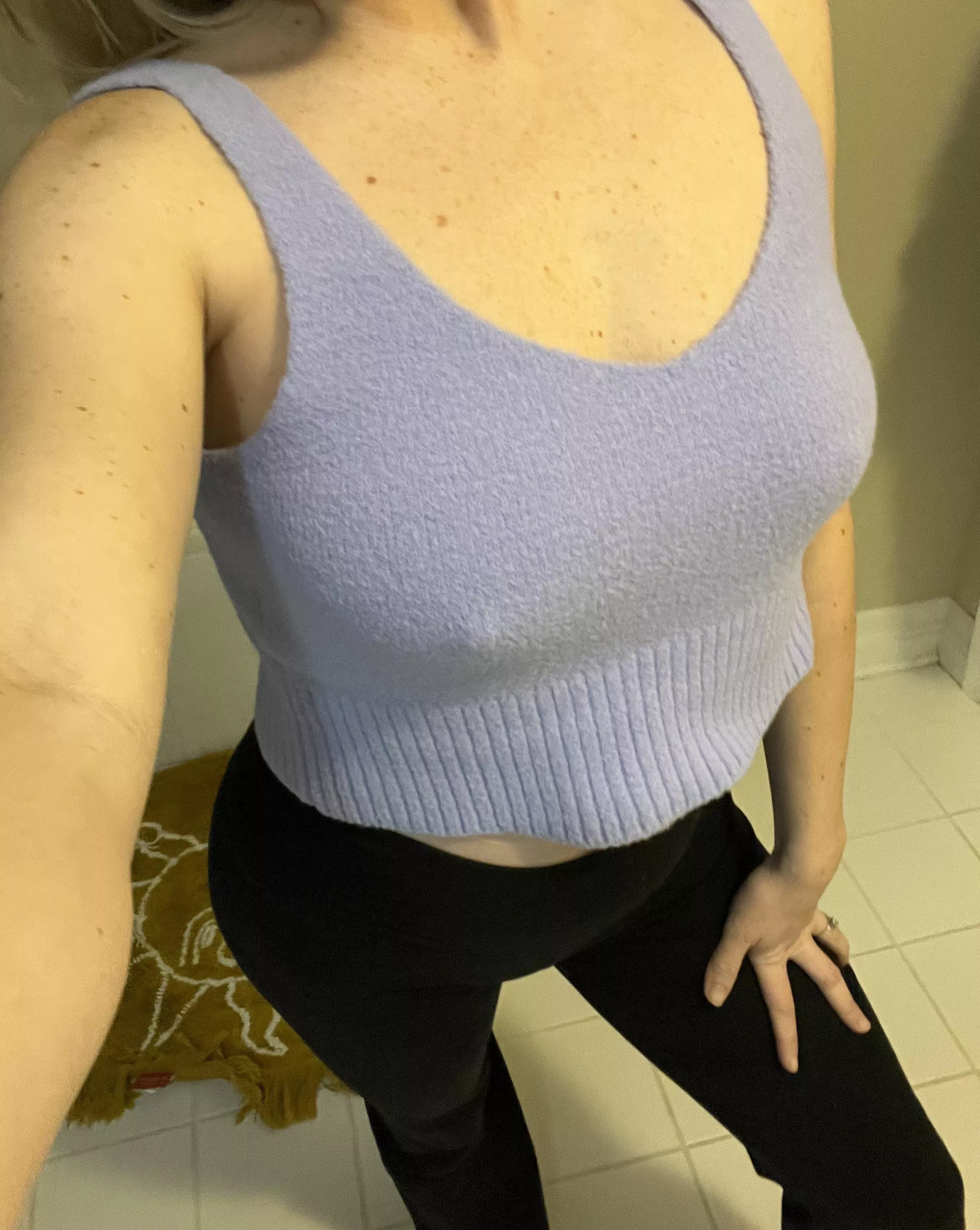 My sweater puppies are poking out of this sweater tank top