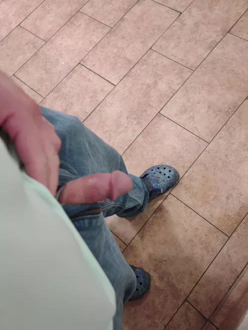 semi hard, mildly nervous as I stood by the public restroom with the door open.