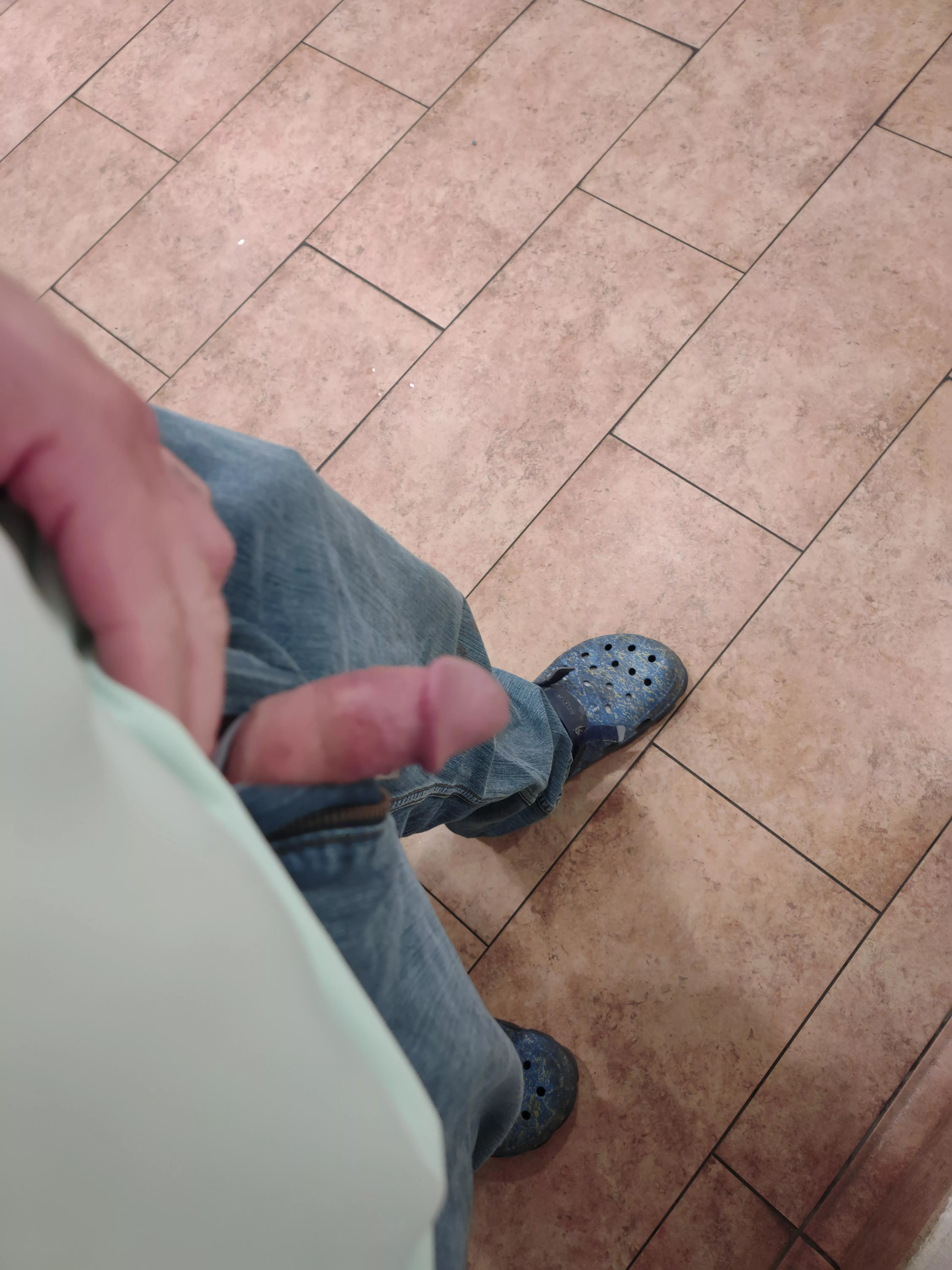 semi hard, mildly nervous as I stood by the public restroom with the door open.