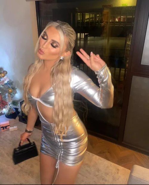 Tiffany wrapped up in shiny dress