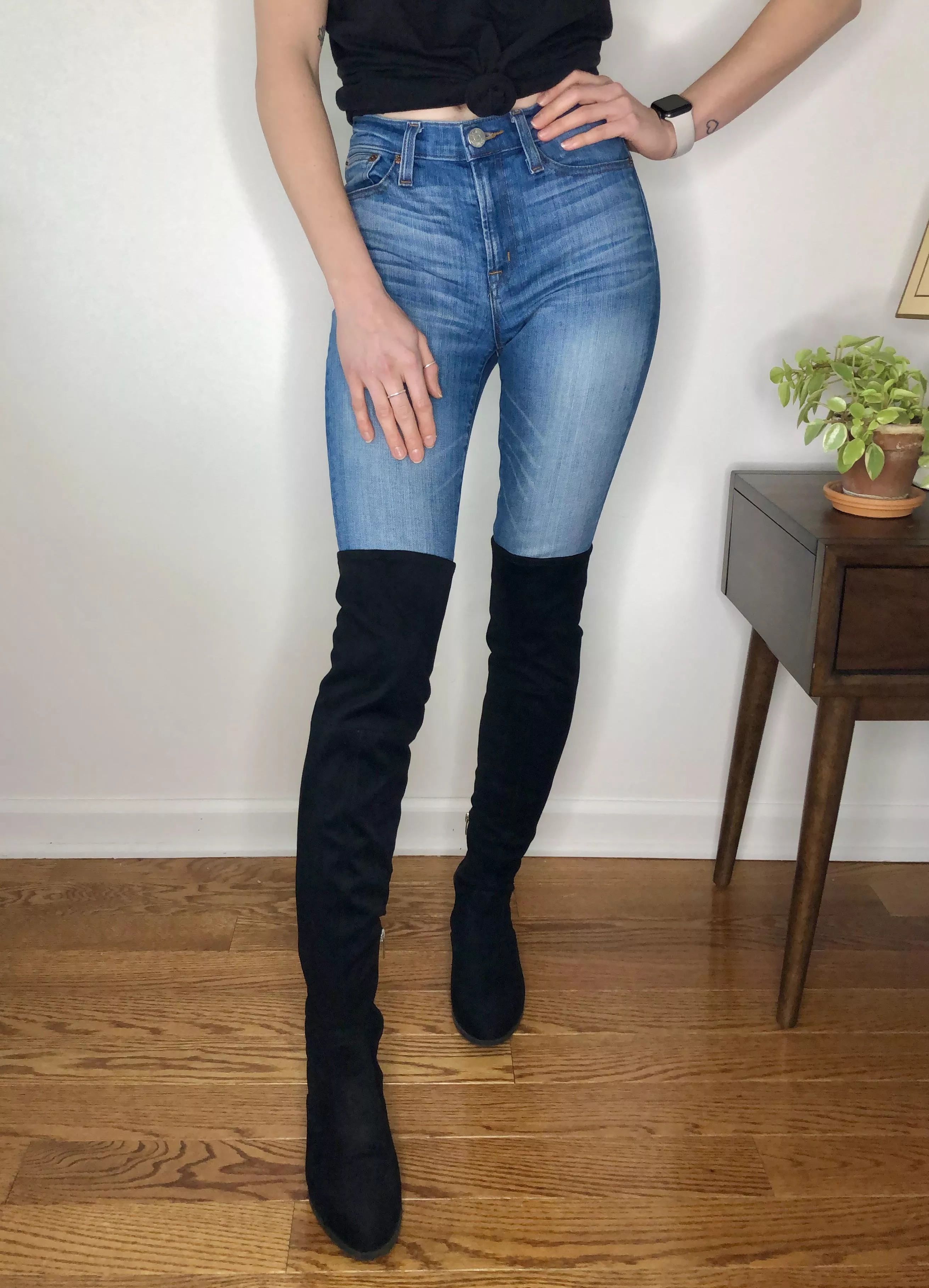 Tight jeans and thigh highs